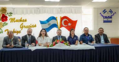 Türkiye&#039;s ambassador to San Salvador, Gül Büyükerşen (L) and TIKA Vice President Ümit Naci Yorulmaz (C) visit the Türkiye Primary School in San Salvador, El Salvador, Oct. 6, 2024. (AA Photo)