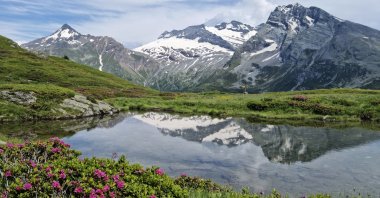 Alpine Pond on Mt. Tochuhorn at Simplon Pass, nestled between the Lepontine and Pennine Alps, marks the international border between Switzerland and Italy, July 19, 2024. (Getty Images)