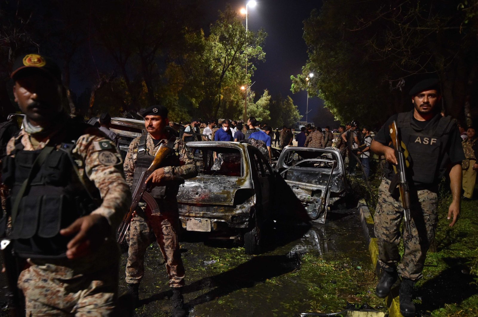 Pakistani security officials inspect the scene of a blast outside the Jinnah international airport in Karachi, Pakistan, Oct. 7, 2024. (EPA Photo)