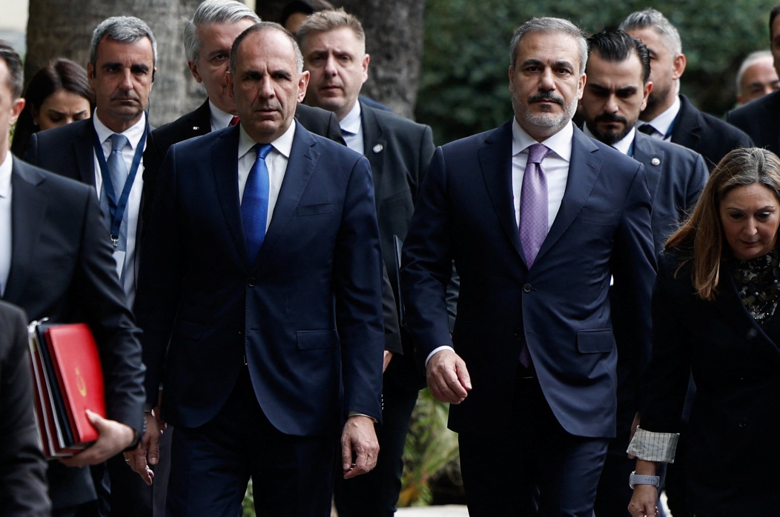 Foreign Minister Hakan Fidan (R) and Greek Foreign Minister Giorgos Gerapetritis walk outside of the Presidential Palace in Athens, Greece, Dec. 7, 2023. (Reuters Photo)