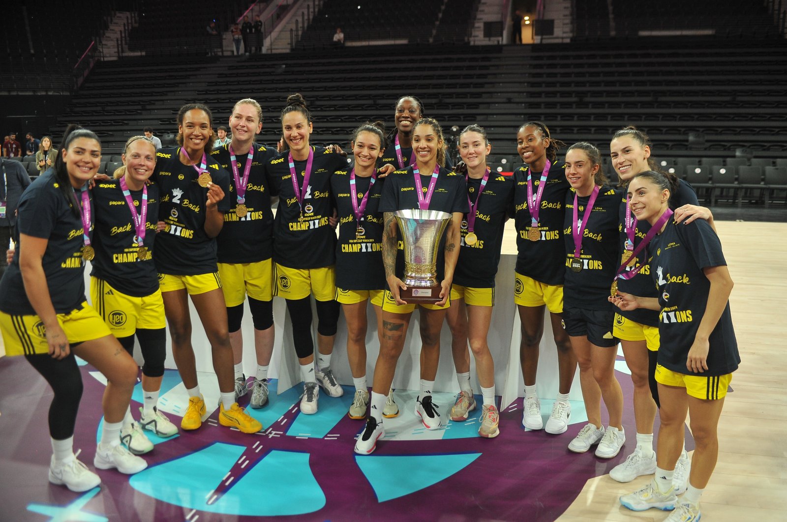 Fenerbahçe Opet pose for a photo with the FIBA Women&#039;s Super Cup, Istanbul, Türkiye, Oct. 3, 2024. (DHA Photo)