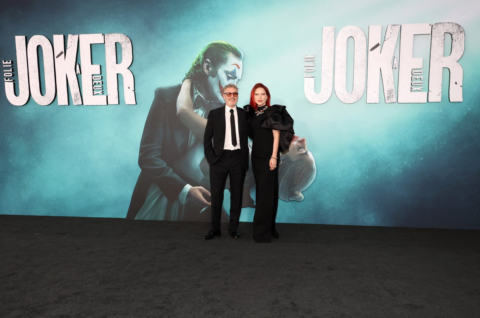 Joaquin Phoenix and Lady Gaga attend the Los Angeles Premiere of Warner Bros. Pictures &quot;Joker: Folie a Deux&quot; at TCL Chinese Theatre, Hollywood, California, U.S., Sept. 30, 2024. (Getty Images via AFP)