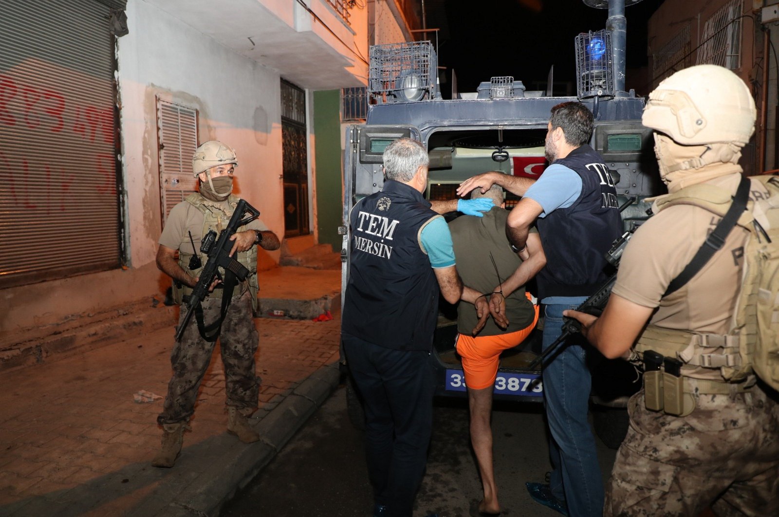 Security forces detain a suspect affiliated with the PKK terrorist group in a raid in southern Mersin province, Türkiye, Oct. 7, 2024. (AA Photo)