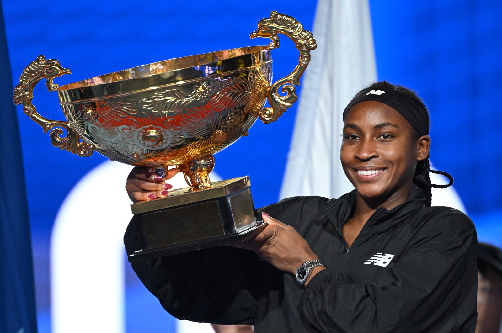 USA&#039;s Coco Gauff celebrates with the trophy after winning the women&#039;s singles final match against Czechia&#039;s Karolina Muchova at the China Open tennis tournament, Beijing, China, Oct. 6, 2024. (AFP Photo)