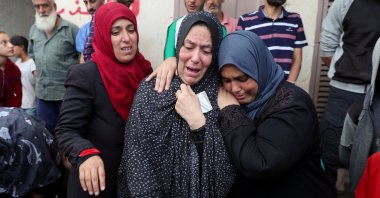 Mourners react next to the bodies of Palestinians killed in Israeli strikes amid the Israeli attacks, at Al-Aqsa Martyrs Hospital, Deir Al-Balah, Gaza Strip, Palestine, Oct. 8, 2024. (Reuters Photo)
