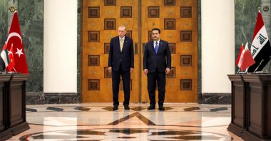 President Recep Tayyip Erdoğan and Iraq's Prime Minister Mohammed Shia Al Sudani (R) look on during the signing of the "Development Road" framework agreement on security, economy, and development in Baghdad, Iraq, April 22, 2024. (Reuters Photo)