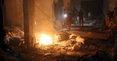 People inspect the site of a military strike in the al-Mazzeh neighborhood in Damascus, Syria, Oct. 2, 2024. (EPA File Photo)