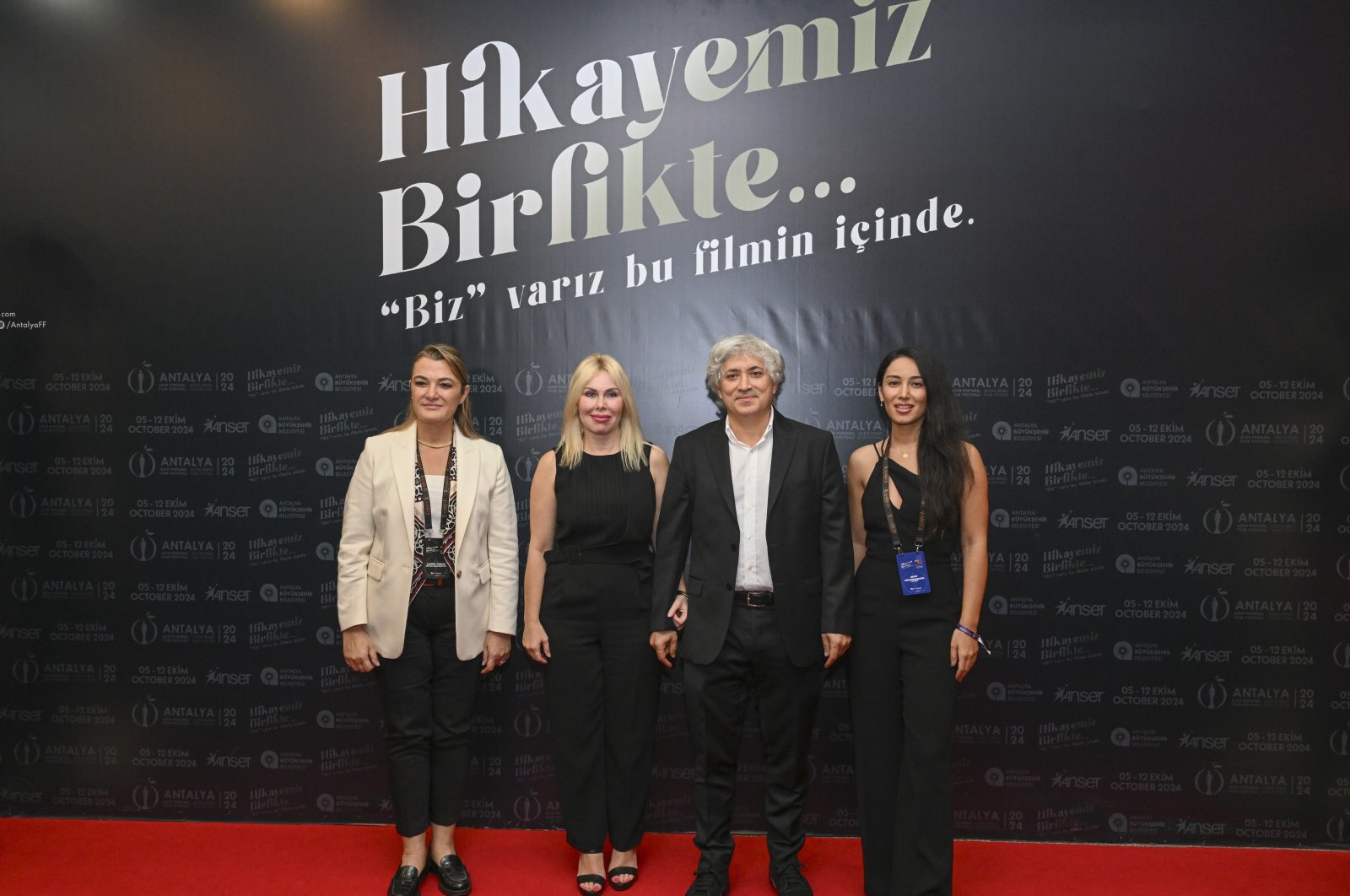 Professor Özlenen Özkan and Ömer Özkan attend the premiere of &quot;Altın Eller&quot; at the Atatürk Cultural Center, Antalya, Türkiye, Oct. 7, 2024. (IHA Photo)