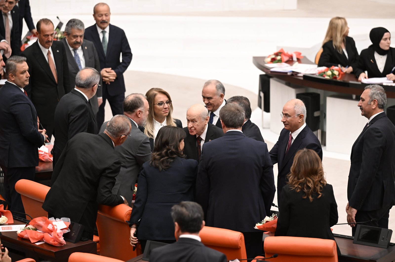 Devlet Bahçeli (C), chair of the Nationalist Movement Party (MHP), shakes hands with members of the Peoples’ Equality and Democracy Party (DEM Party) and the Republican People&#039;s Party (CHP) at the opening of the 28th term legal year of Parliament, Ankara, Türkiye, Oct. 1, 2024. (AA Photo)