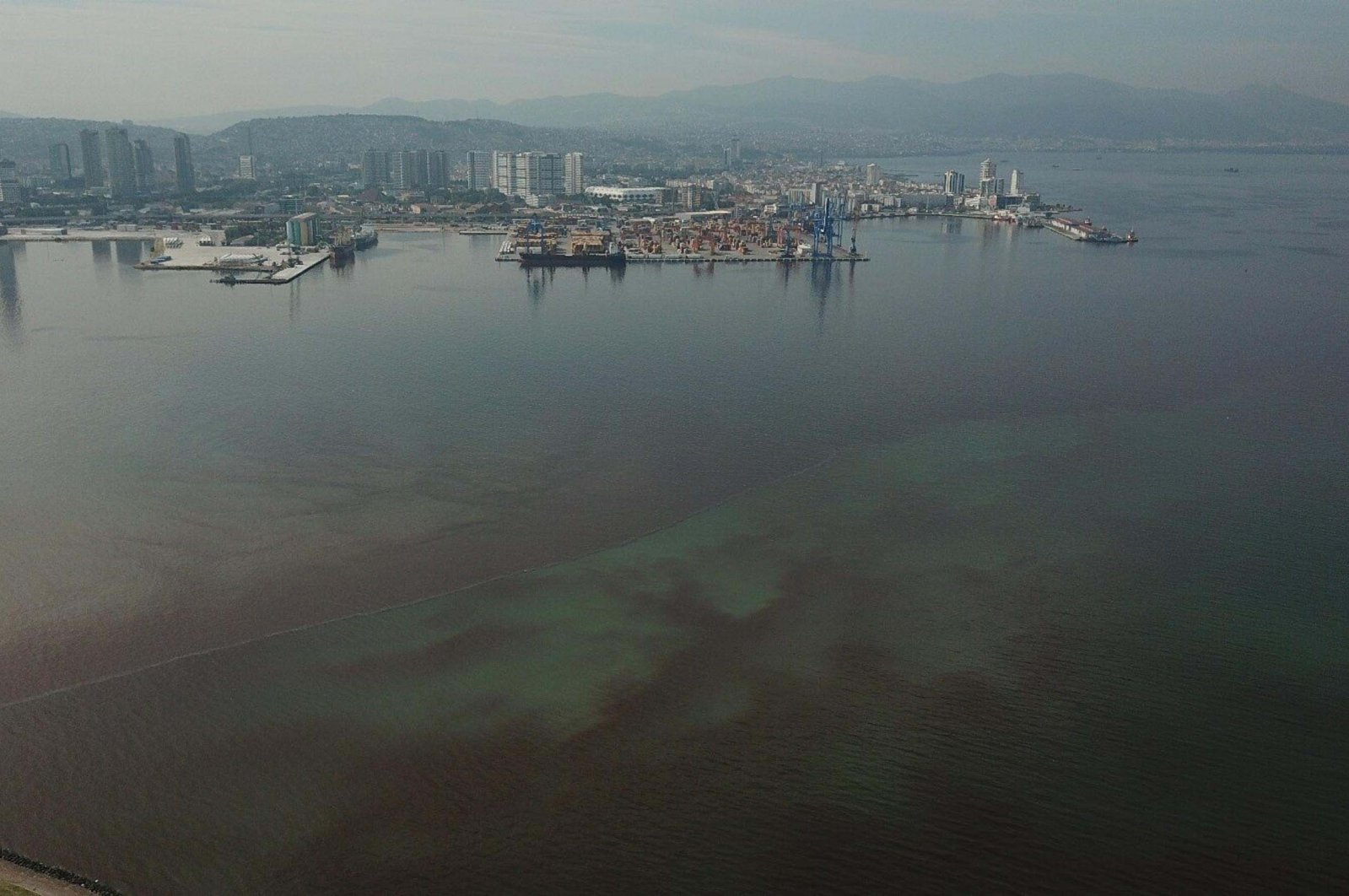 Aerial footage of Izmir Bay shows a dramatic color shift, indicating pollution levels, Izmir, Türkiye, Sept. 22, 2024. (DHA Photo)