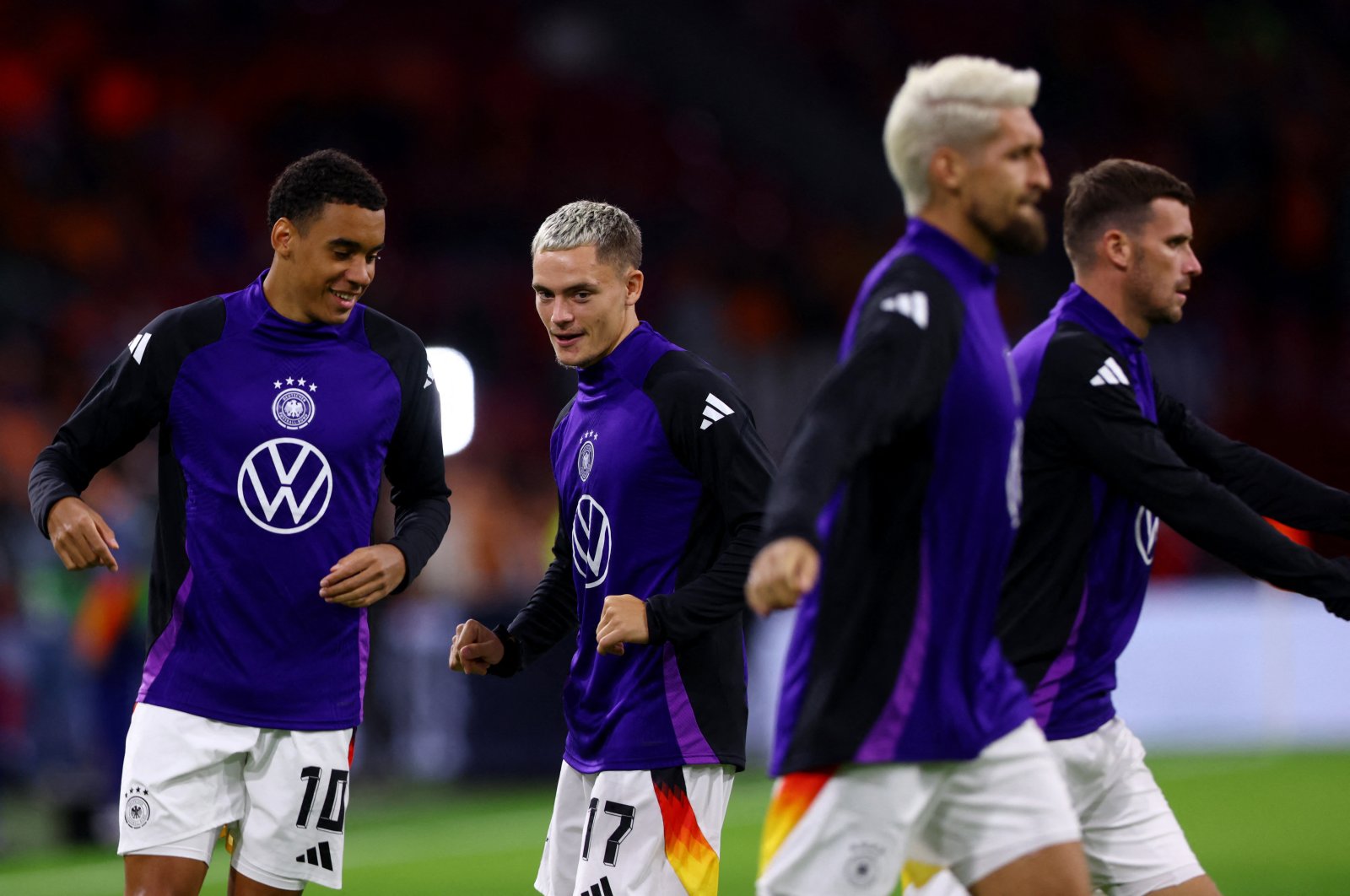 Germany&#039;s Florian Wirtz and Jamal Musiala during the warm-up before the Nations League, Group 3 match against the Netherlands, Johan Cruyff Arena, Amsterdam, Netherlands, Sept. 10, 2024. (Reuters Photo)