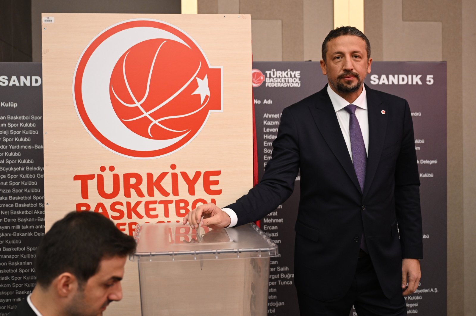 Turkish Basketball Federation President casts a ballot during the Ordinary General Assembly, Ankara, Türkiye, Oct. 8, 2024. (AA Photo)