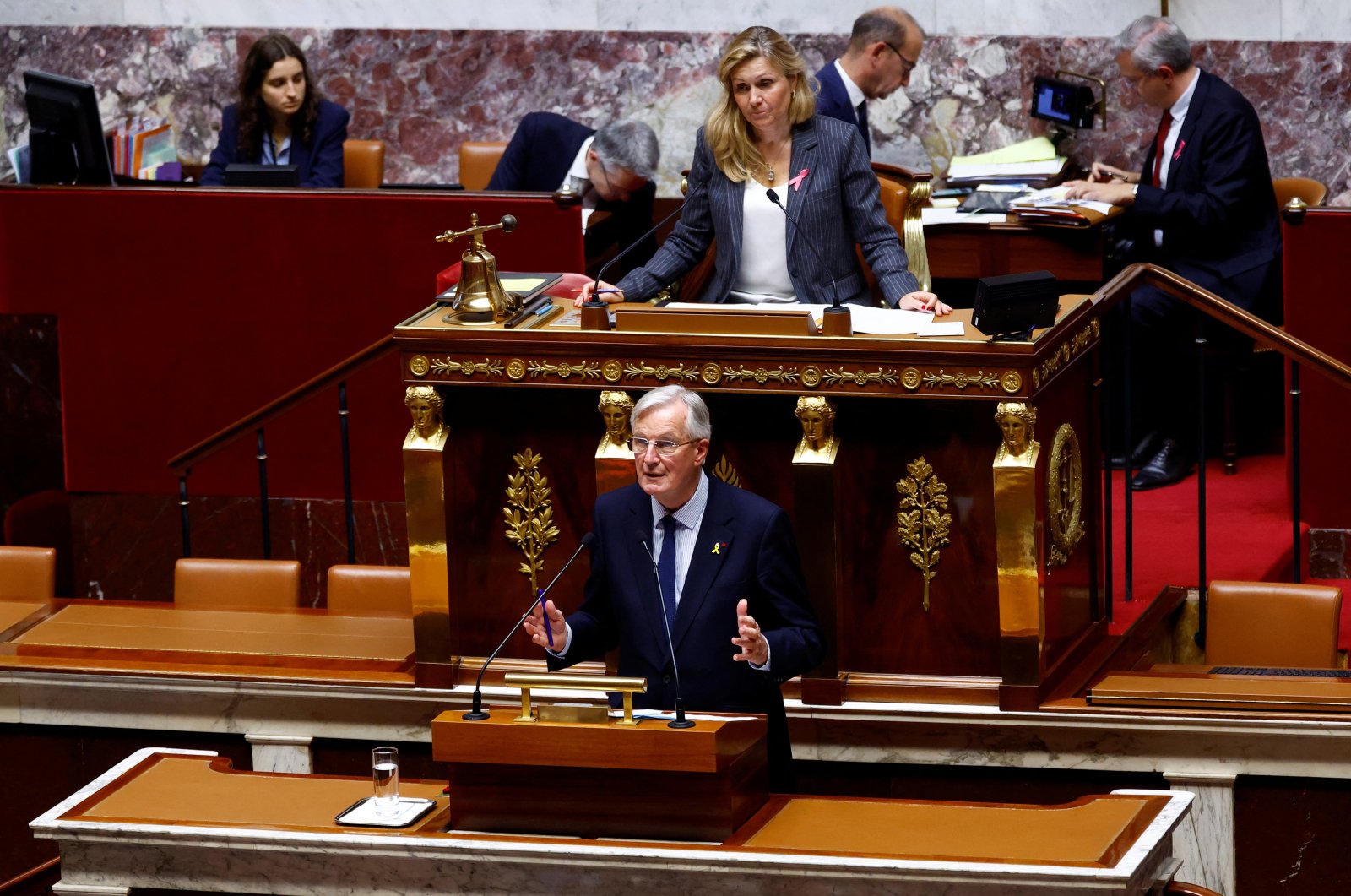 
French Prime Minister Michel Barnier delivers a speech during a censure motion debate filed by the alliance of left-wing parties the &quot;Nouveau Front Populaire&quot; (New Popular Front - NFP), after the questions to the government session at the National Assembly in Paris, France, Oct. 8, 2024. (Reuters Photo)