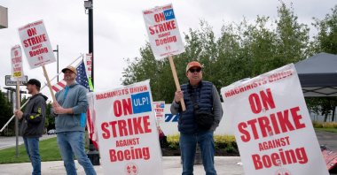 Boeing factory workers and supporters gather on a picket line during the third day of a strike near the entrance to a Boeing production facility in Renton, Washington, U.S., Sept. 15, 2024. (Reuters Photo)