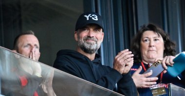 Jurgen Klopp (C) stands in the stands before the start of the match between Mainz and Werder Bremen, Rhineland-Palatinate, Germany, Sept. 15, 2024. (Getty Images Photo)