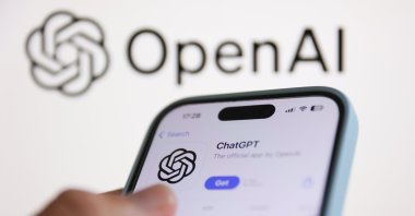 The OpenAI logo is displayed on a laptop screen along with the ChatGPT icon on AppStore displayed on a phone screen as seen in this illustration photo taken in Poland, Aug. 8, 2024. (Reuters Photo)