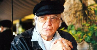 In this undated and file photo, late Turkish writer and poet Atilla Ilhan poses to cameras during an interview. (AA Photo)