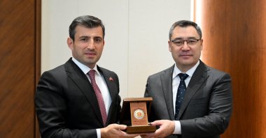 Baykar CTO Selçuk Bayraktar receives a state order from President Sadyr Japarov in Bishkek, Kyrgyzstan, Oct. 9, 2024. (IHA Photo)