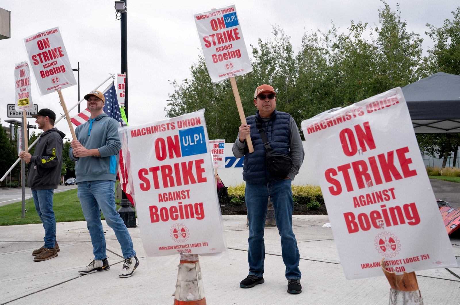 Boeing factory workers and supporters gather on a picket line during the third day of a strike near the entrance to a Boeing production facility in Renton, Washington, U.S., Sept. 15, 2024. (Reuters Photo)