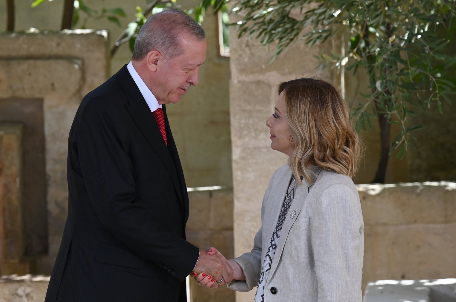 President Recep Tayyip Erdoğan is welcomed by Italian Prime Minister Giorgia Meloni at the G-7 summit, Apulia, Italy, June 14, 2024. (Getty Images)