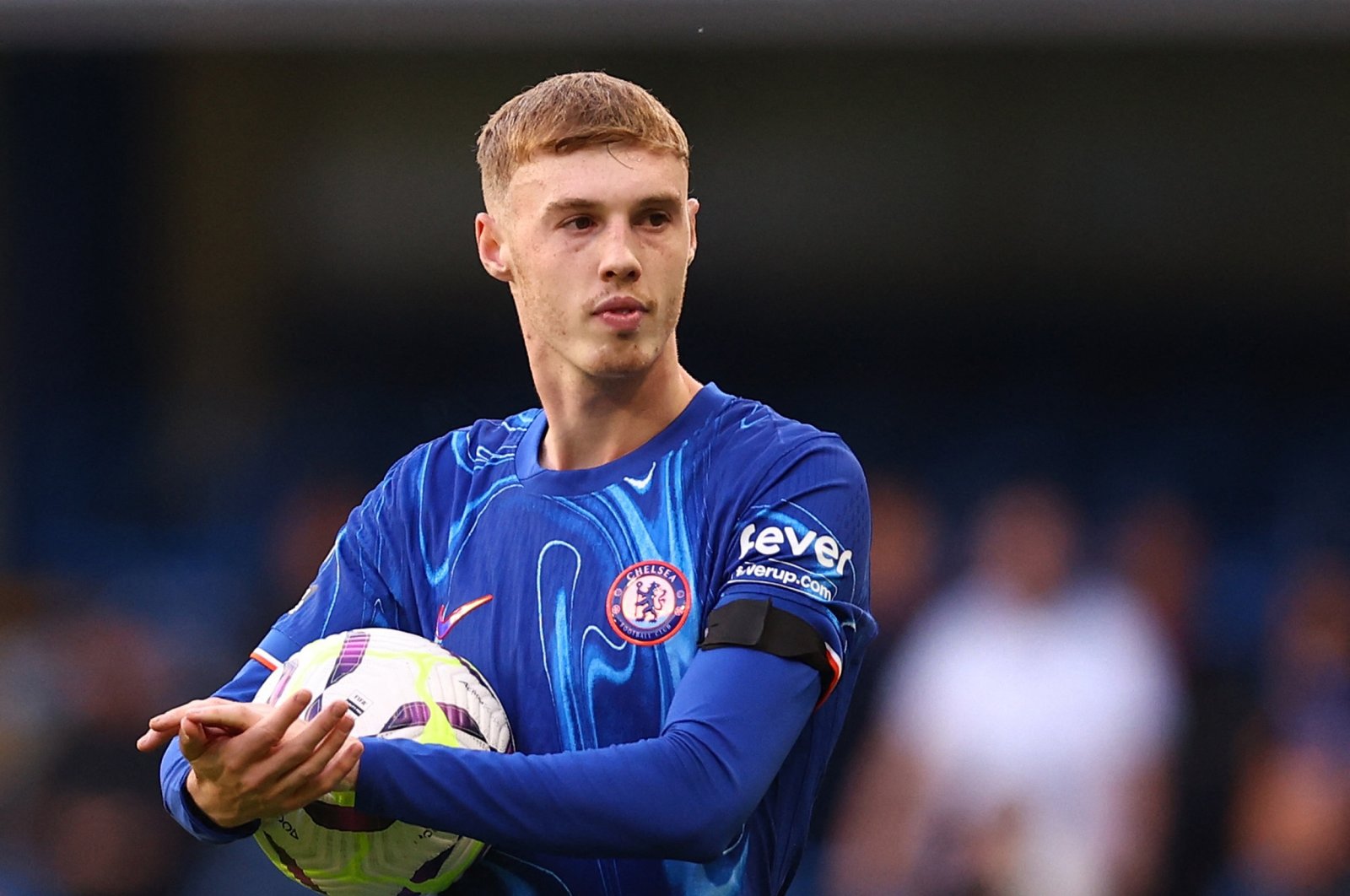 Chelsea&#039;s Cole Palmer celebrates with the match ball after scoring a hat trick during the Premier League match against Brighton & Hove Albion at the Stamford Bridge, London, U.K., Sept. 28, 2024. (Reuters Photo) 