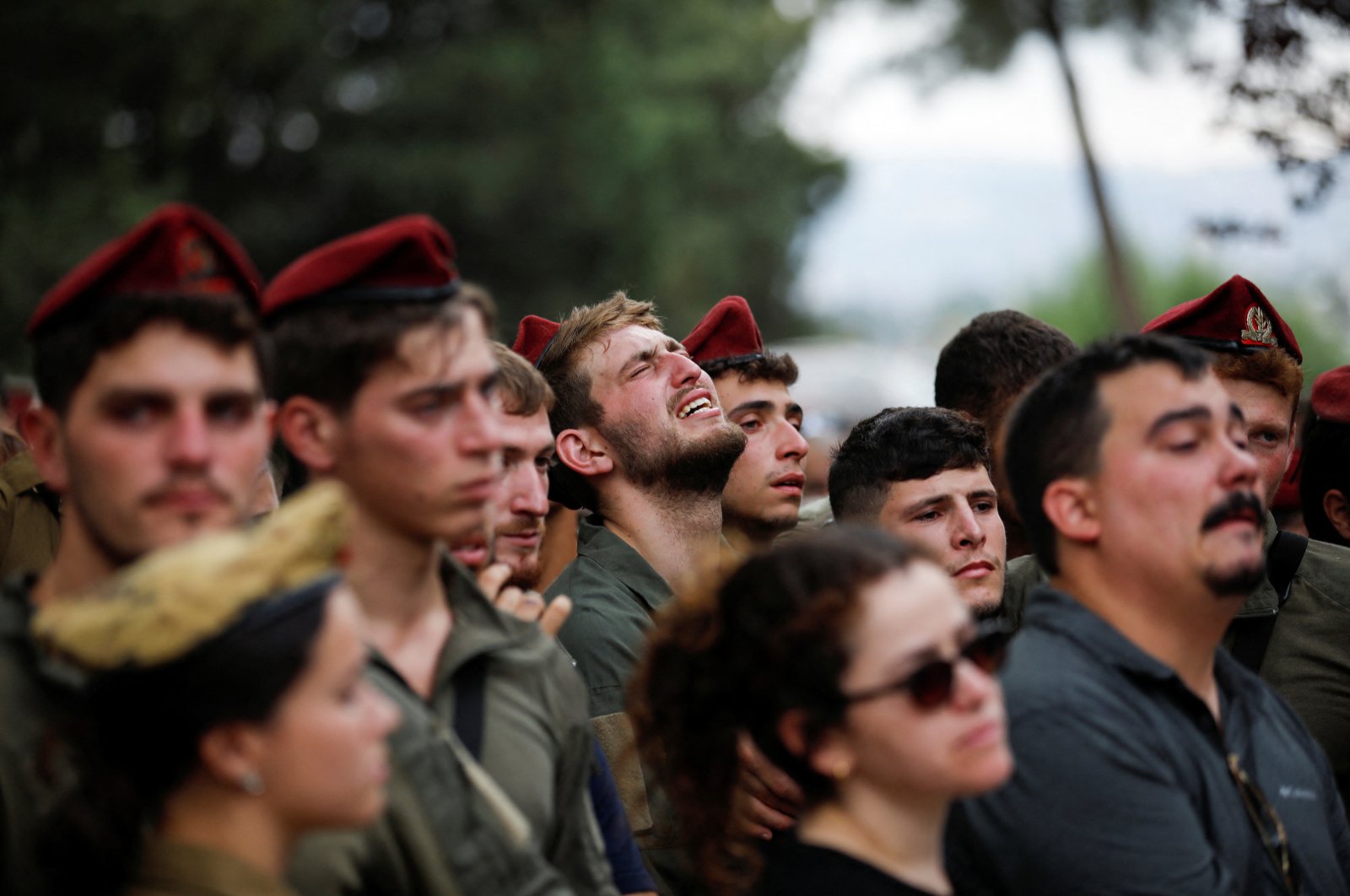 
People mourn Israeli soldier Sergeant First Class Nazar Itkin, who was killed in southern Lebanon, during his funeral in Kiryat Ata, Israel, Oct. 6, 2024. (Reuters Photo)