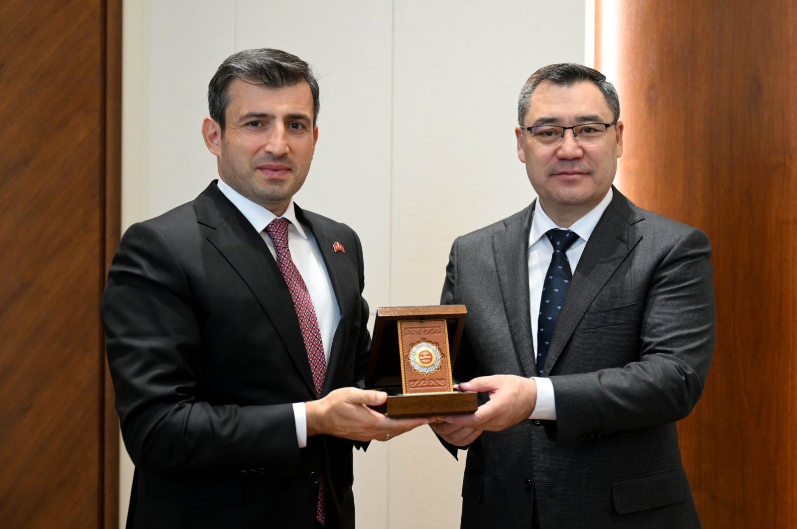 Baykar CTO Selçuk Bayraktar receives a state order from President Sadyr Japarov in Bishkek, Kyrgyzstan, Oct. 9, 2024. (IHA Photo)