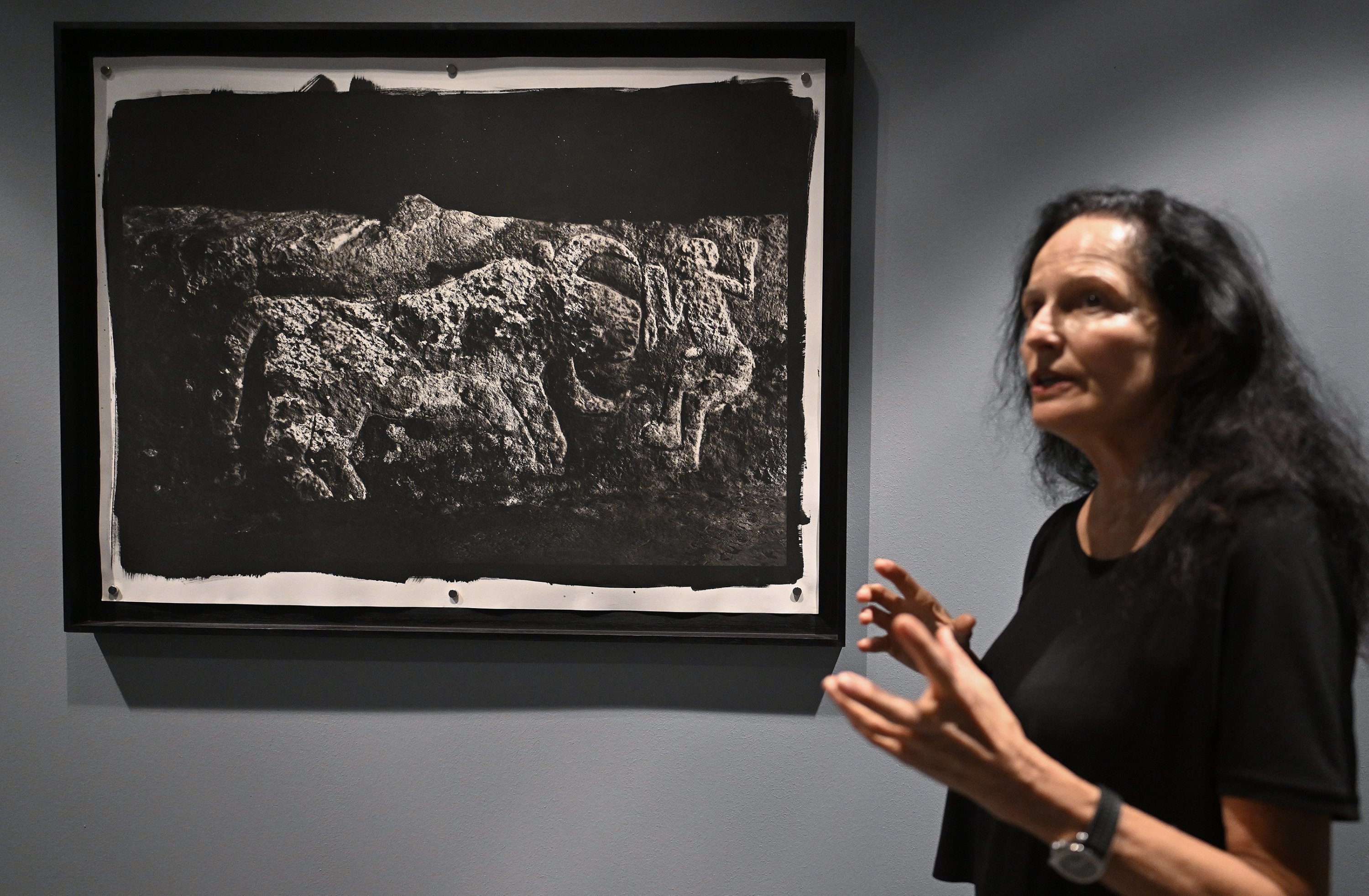 Spanish photographer Isabel Munoz showcases her photographs at the exhibition 