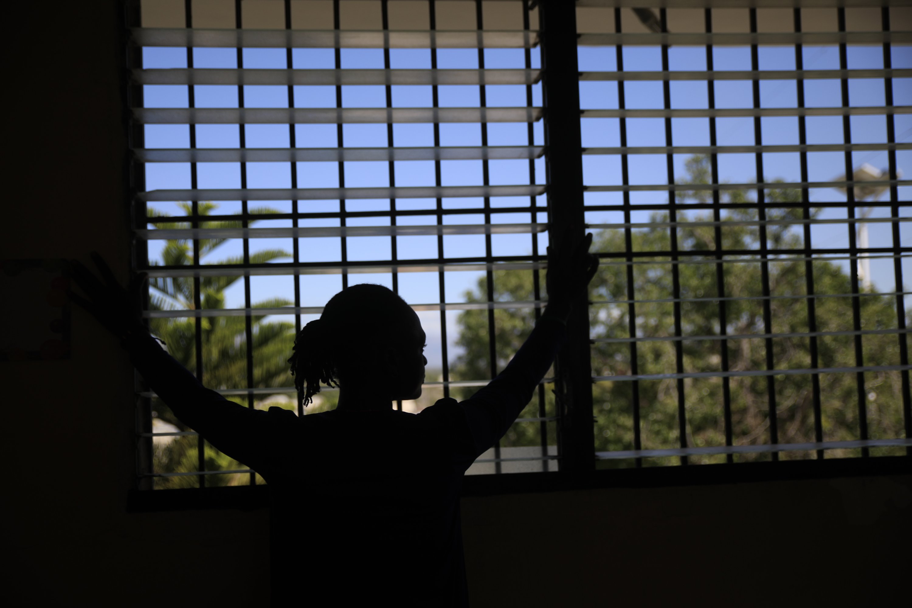 A sexual abuse victim poses for a photo at a clinic near Port-au-Prince, Haiti, Jan. 20, 2023. (AP Photo)