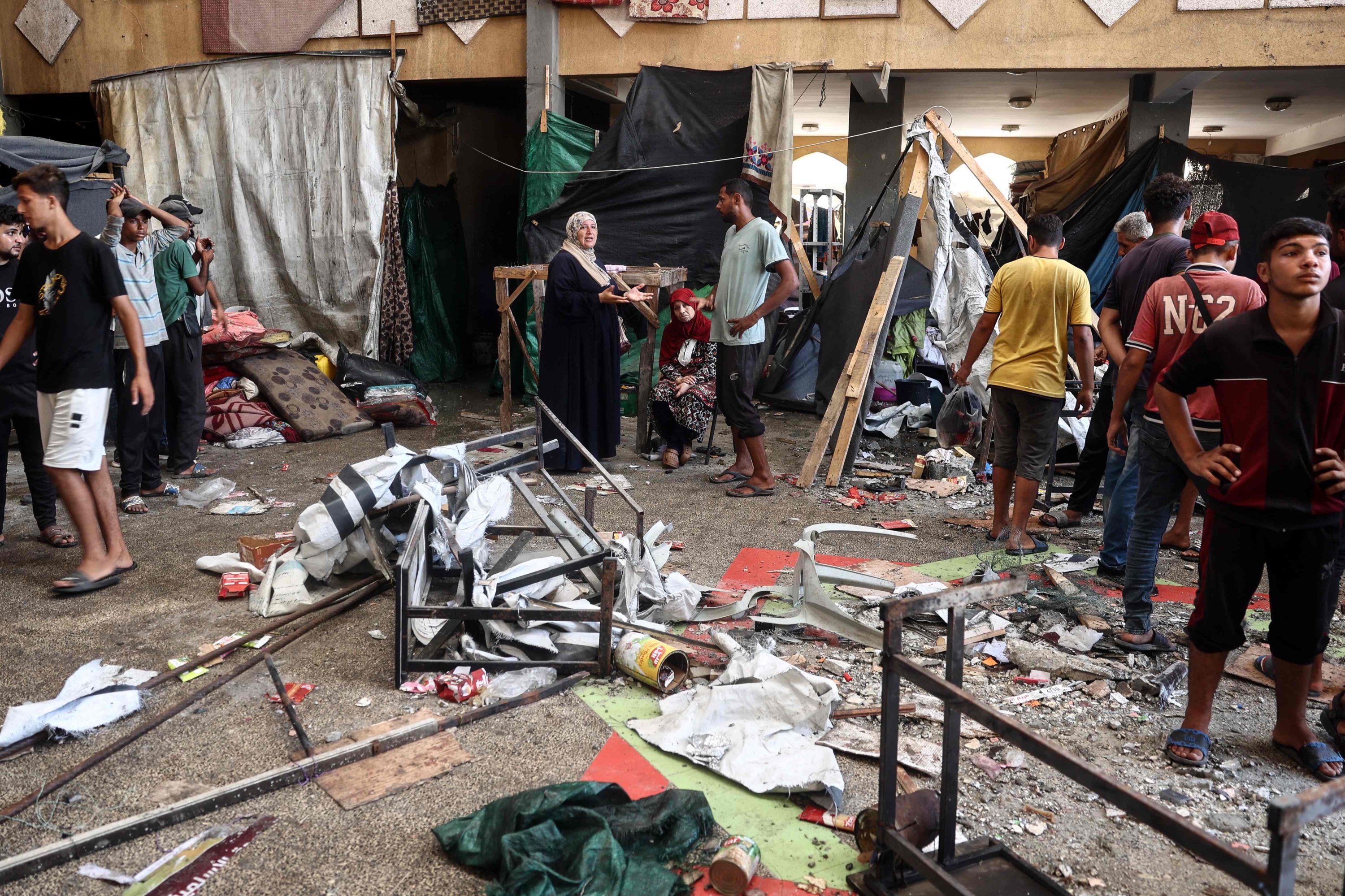 Palestinians react after an Israeli strike hit the Rafida school sheltering displaced people in Deir al-Balah, central Gaza Strip, Palestine, Oct. 10, 2024. (AFP Photo)