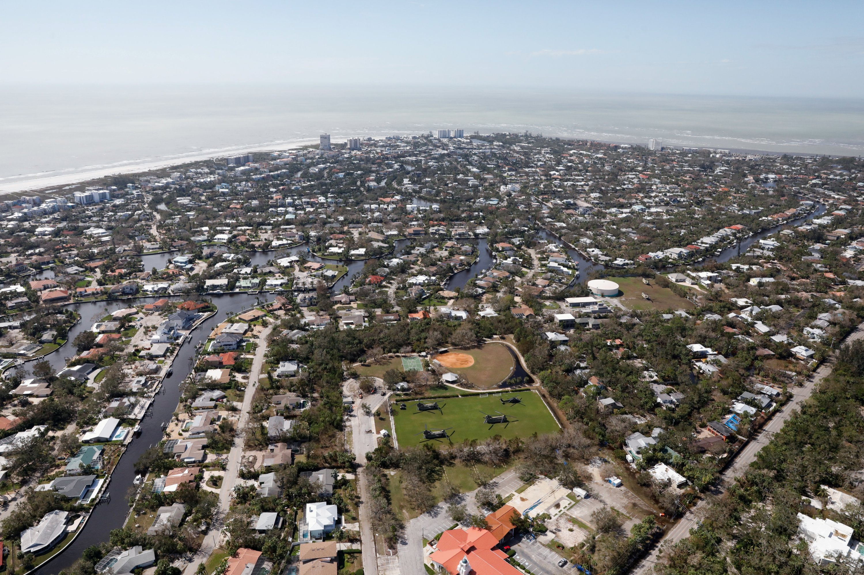 An aerial view shows helicopters sitting on a field after Hurricane Milton's landfall in Siesta Key, Florida, U.S., Oct. 10, 2024. (Reuters Photo)