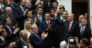 President Recep Tayyip Erdoğan waves a hand to the members and supporters of his ruling Justice and Development Party (AK Party) during a party gathering, Ankara, Türkiye, Oct. 9, 2024. (AA Photo)