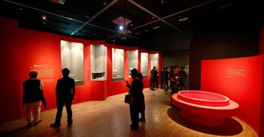 Visitors are examining the artifacts from the Hittite civilization at the Gimhae National Museum, Gimhae, South Korea, Oct. 8, 2024. (IHA Photo)