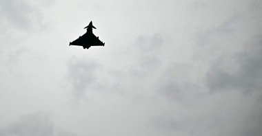 Eurofighter jets that accompanied the aircraft of Italy's President Mattarella fly over Berlin Brandenburg Airport in Schoenefeld, southeast of the German capital Berlin, Sept. 26, 2024. (AFP Photo)