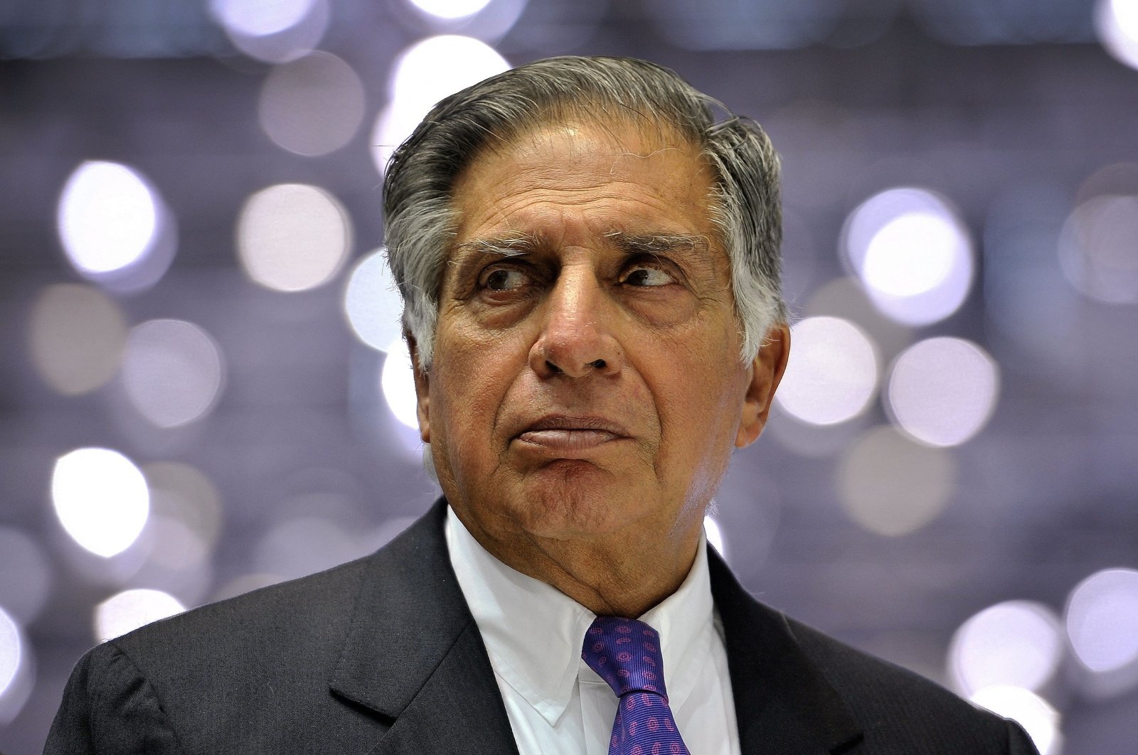 Chairperson of India&#039;s Tata Motors Chairperson Ratan Tata watches during the unveiling of the Tata Megapixel, Geneva, Switzerland, March 6, 2012. (AFP File Photo)