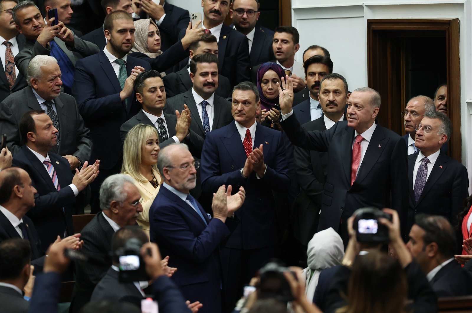 President Recep Tayyip Erdoğan waves a hand to the members and supporters of his ruling Justice and Development Party (AK Party) during a party gathering, Ankara, Türkiye, Oct. 9, 2024. (AA Photo)