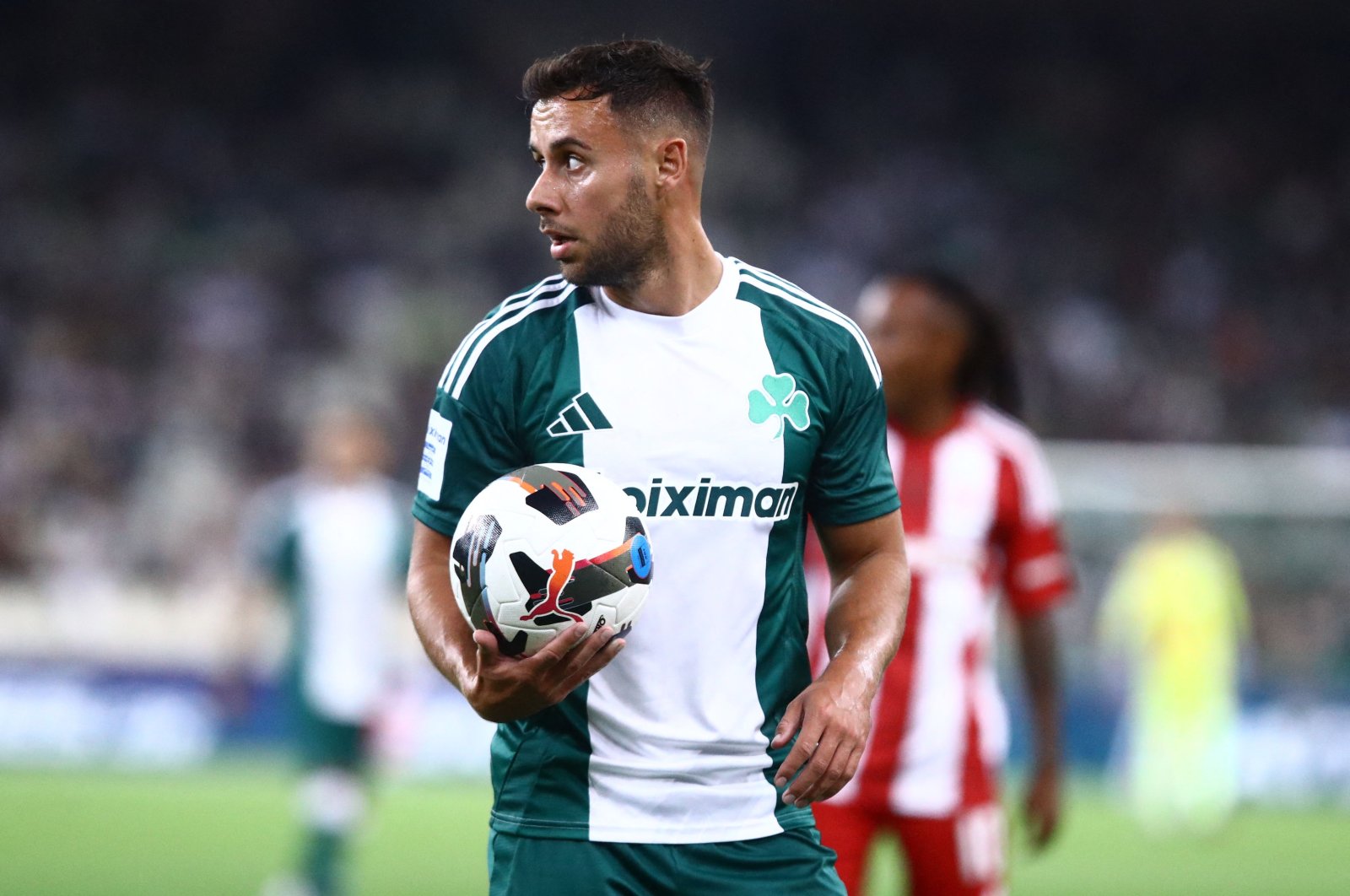 The late Panathinaikos’ Greece defender George Baldock holds the ball during the Super League Greece football match against Olympiacos at the Athens Olympic Stadium, Athens, Greece, Oct. 6, 2024. (AFP Photo)