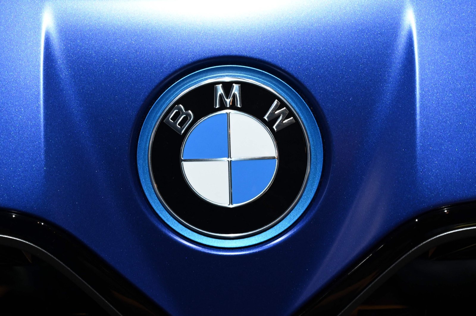 The logo of the German carmaker BMW can be seen on a car at the International Motor Show (IAA) Germany, Munich, Germany, Sept. 8, 2021. (AFP Photo)