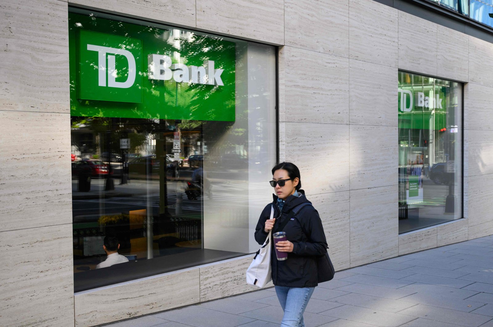 A pedestrian passes by a TD Bank branch in Washington, D.C., U.S., Oct. 10, 2024. (AFP Photo)