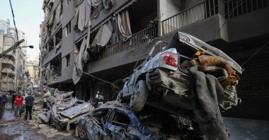 Wrecked cars sit at the site of an Israeli airstrike in the Basta area amid the ongoing conflict between Israel and Hezbollah, Beirut, Lebanon, Oct. 11, 2024. (AFP Photo)