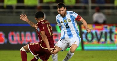 Argentina&#039;s forward Lionel Messi (R) and Venezuela&#039;s midfielder Jose Martinez fight for the ball during the 2026 FIFA World Cup South American qualifiers football match between Venezuela and Argentina, at the Monumental de Maturin stadium, Maturin, Venezuela, Oct. 10, 2024. (AFP Photo)