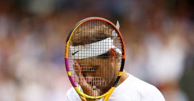 Spain&#039;s Rafael Nadal reacts during his Wimbledon quarterfinal match against Taylor Fritz at the All England Lawn Tennis and Croquet Club, London, U.K., July 6, 2022. (Reuters Photo)  