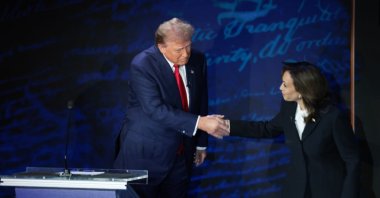 Republican presidential nominee, former U.S. President Donald Trump (L), and Democratic presidential nominee, U.S. Vice President Kamala Harris, shake hands before their first debate, Philadelphia, Pennsylvania, U.S., Sept. 10, 2024. (Getty Images Photo)