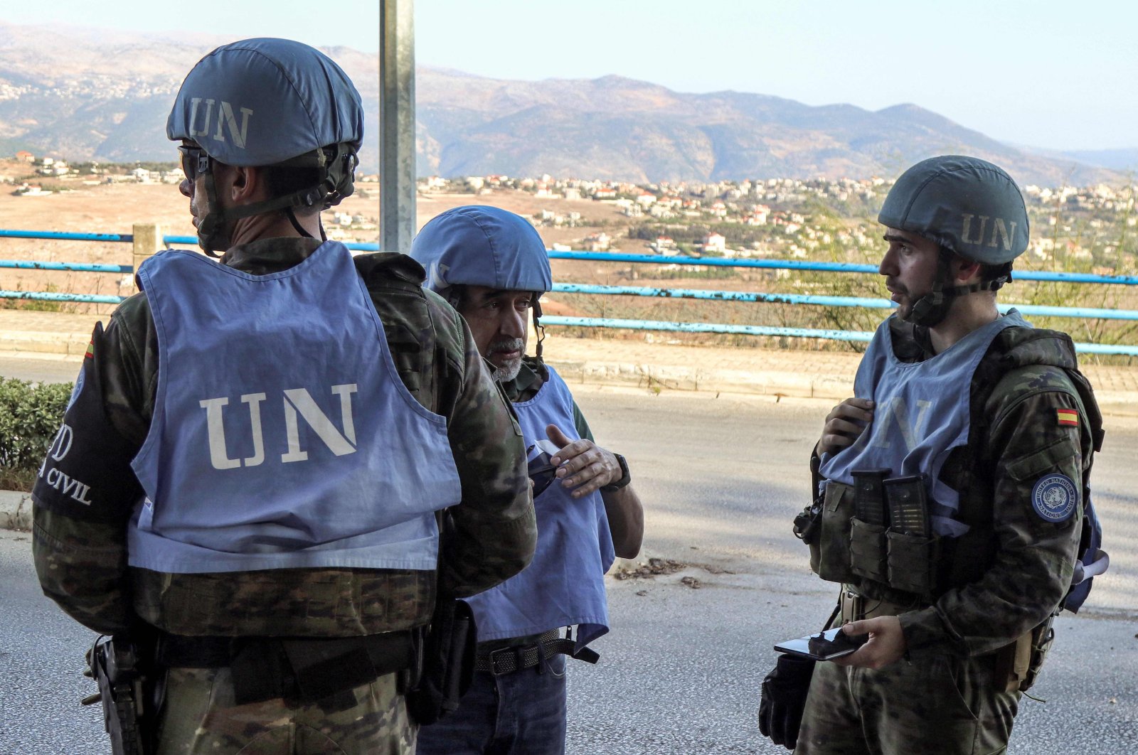 Spanish peacekeepers of the United Nations Interim Force in Lebanon (UNIFIL) coordinate their patrol with the Lebanese Military Police, Marjayoun, south Lebanon, Oct. 8, 2024. (AFP Photo)