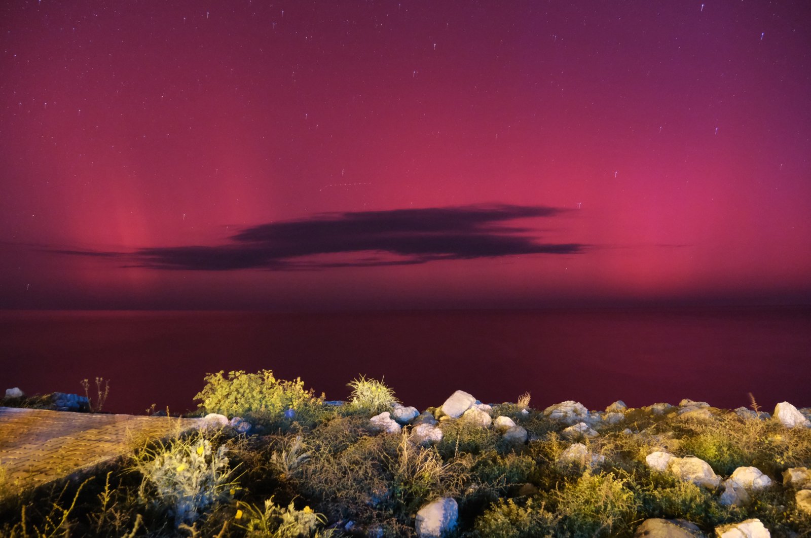 The northern lights, known as the aurora borealis, is observed in Bozkurt, Kastamonu, northern Türkiye, Oct. 10, 2024. (AA Photo)