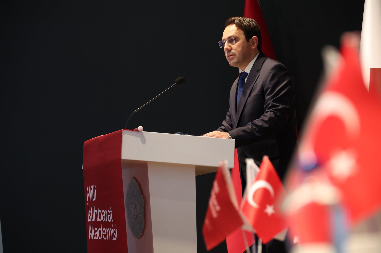 Professor Talha Köse, head of the National Intelligence Academy, delivers a speech at a panel on regional conflicts related to the Gaza war on the first anniversary of its outbreak, at the academy&#039;s headquarters in Ankara, Türkiye, Oct. 8, 2024. (AA Photo)