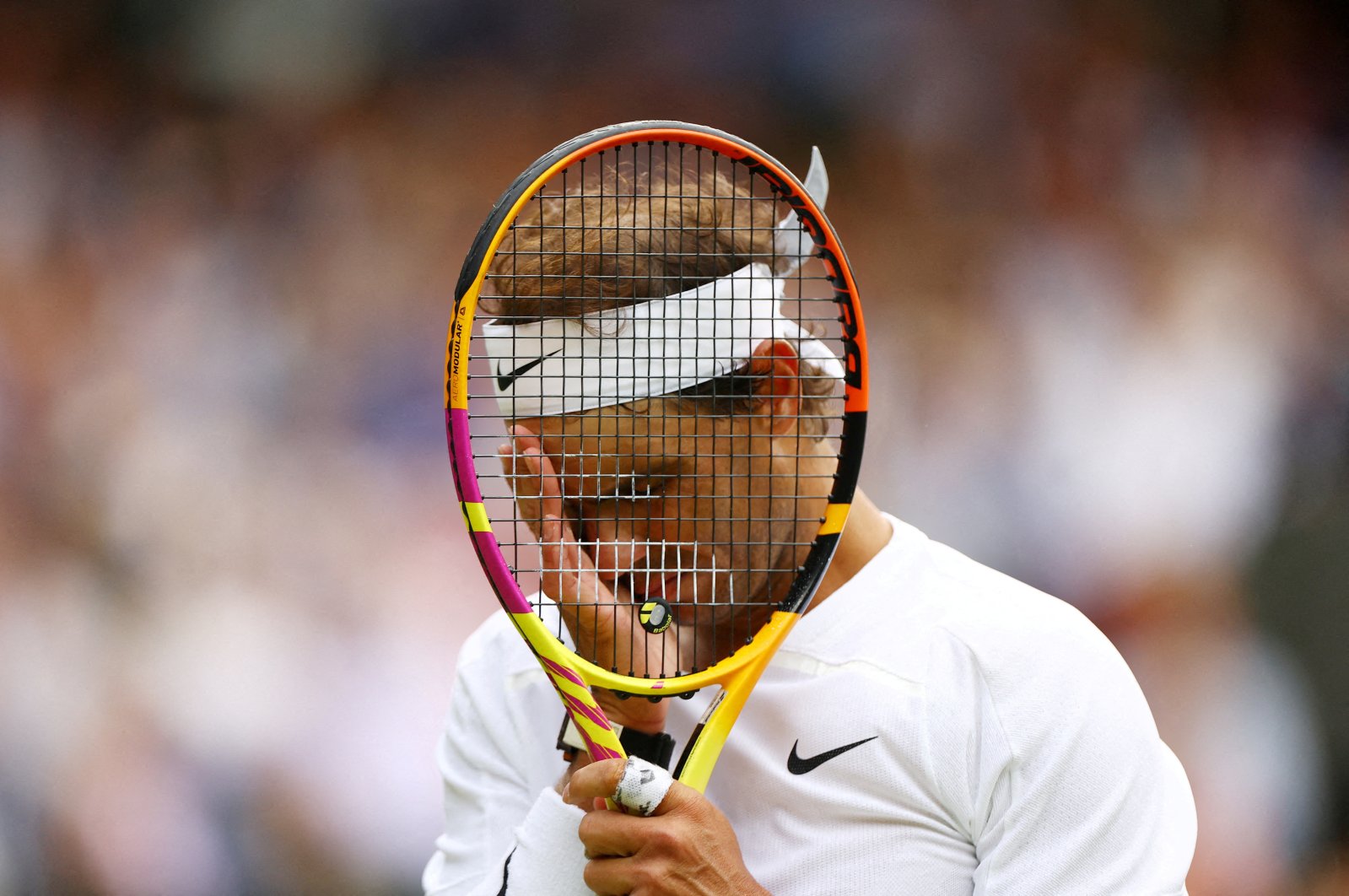 Spain&#039;s Rafael Nadal reacts during his Wimbledon quarterfinal match against Taylor Fritz at the All England Lawn Tennis and Croquet Club, London, U.K., July 6, 2022. (Reuters Photo)  