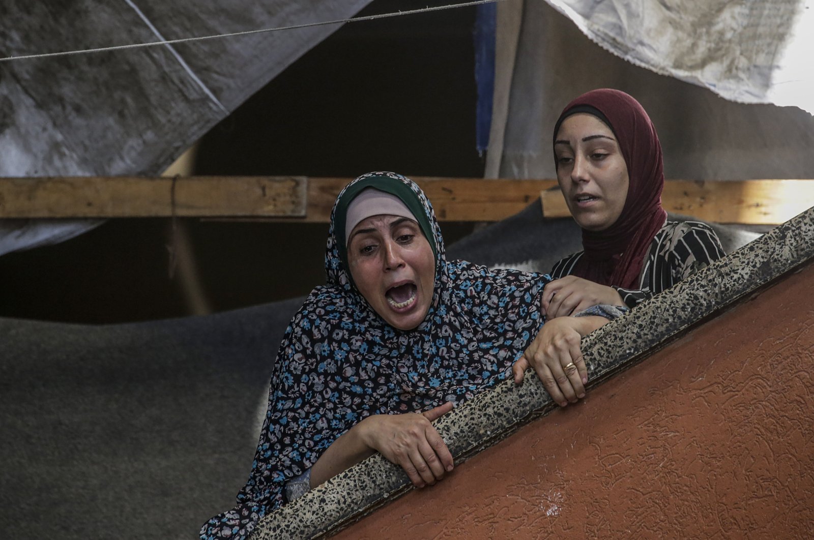 A Palestinian woman mourns her relatives who were killed in an Israeli airstrike on the Rufaida School, in Deir al-Balah, central Gaza Strip, Palestine, Oct. 10, 2024. (EPA Photo)