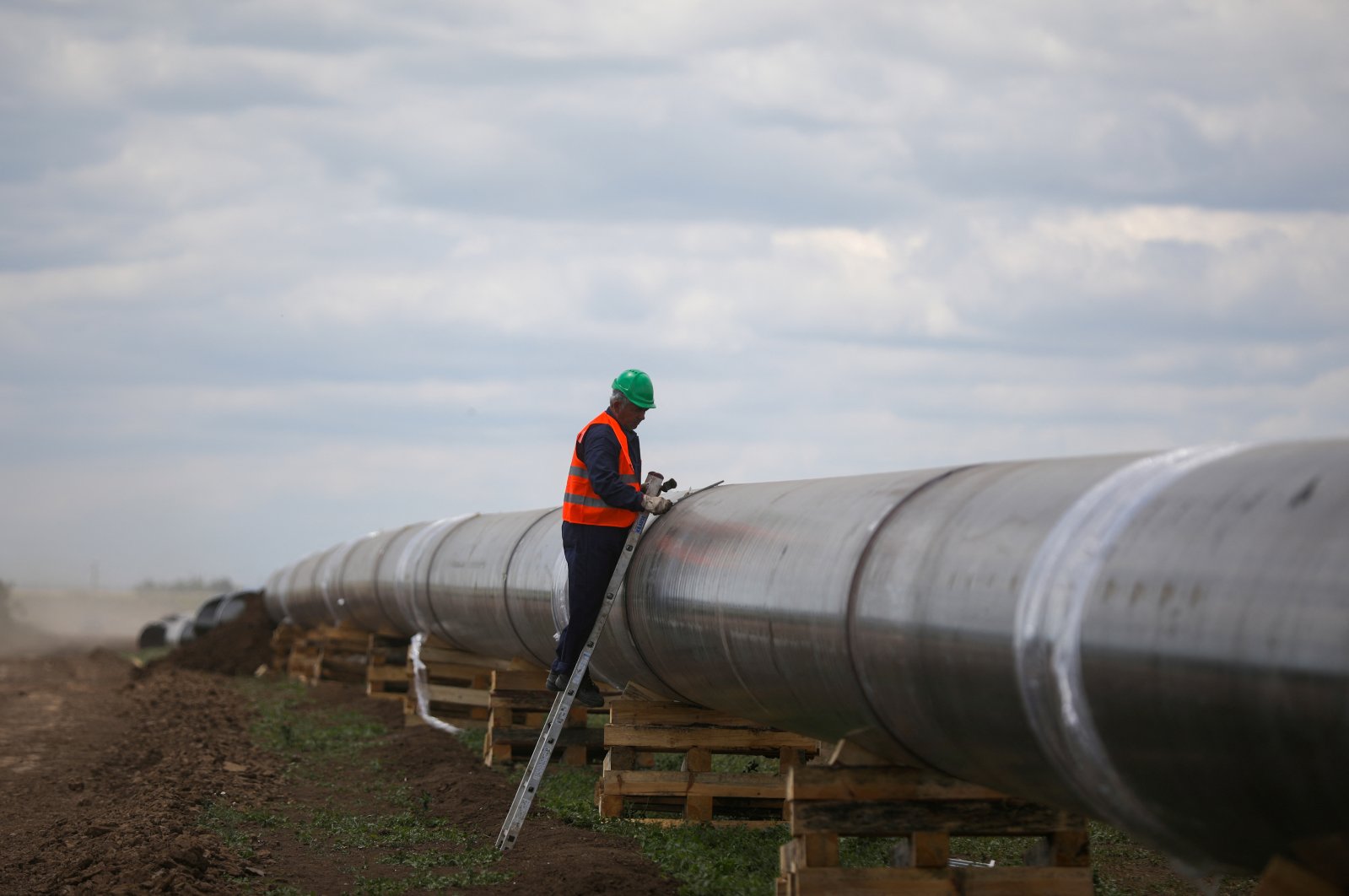 A worker is seen next to a pipe at a construction site on the extension of Russia&#039;s TurkStream gas pipeline after a visit of Serbia&#039;s President Aleksandar Vucic and Bulgaria&#039;s Prime Minister Boyko Borissov, Letnitsa, Bulgaria, June 1, 2020. (Reuters Photo)