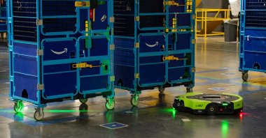 Proteus, an autonomous robot used to carry carts full of packages to delivery trucks, is seen at the Amazon MQY1 warehouse, Mount Juliet, Tennessee, U.S., Oct. 9, 2024. (AFP Photo)